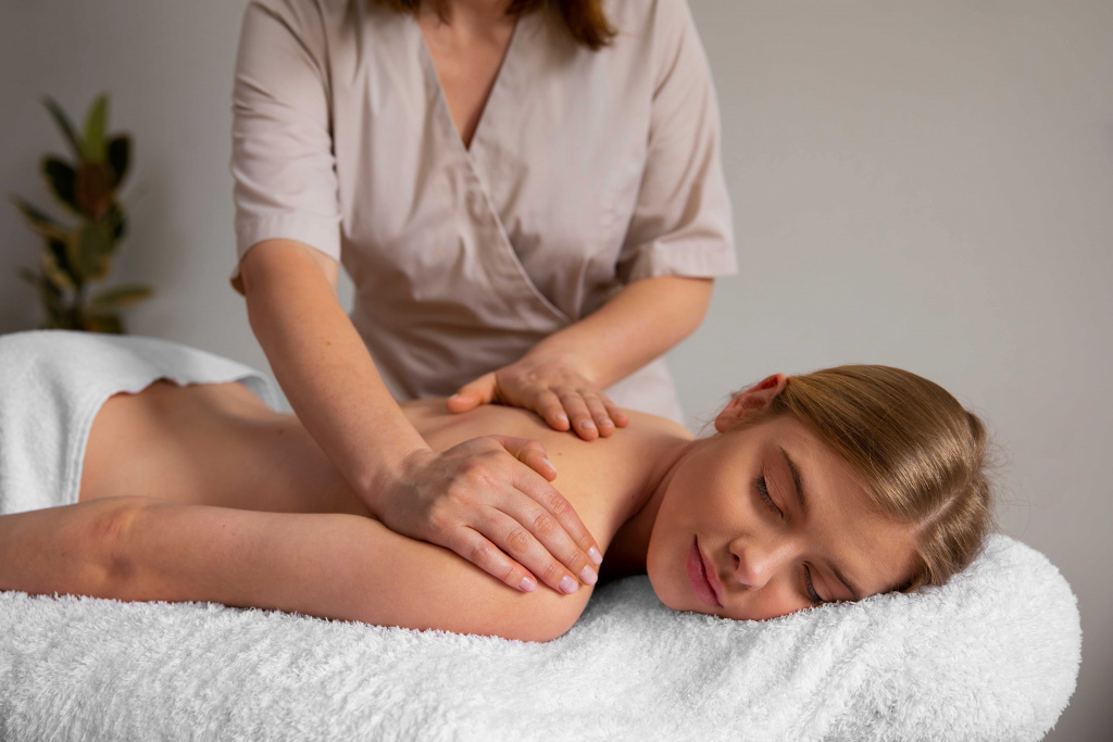 woman-getting-back-massage-from-masseur (1) (1).jpg woman-getting-back-massage-from-masseur (1) (1).jpg