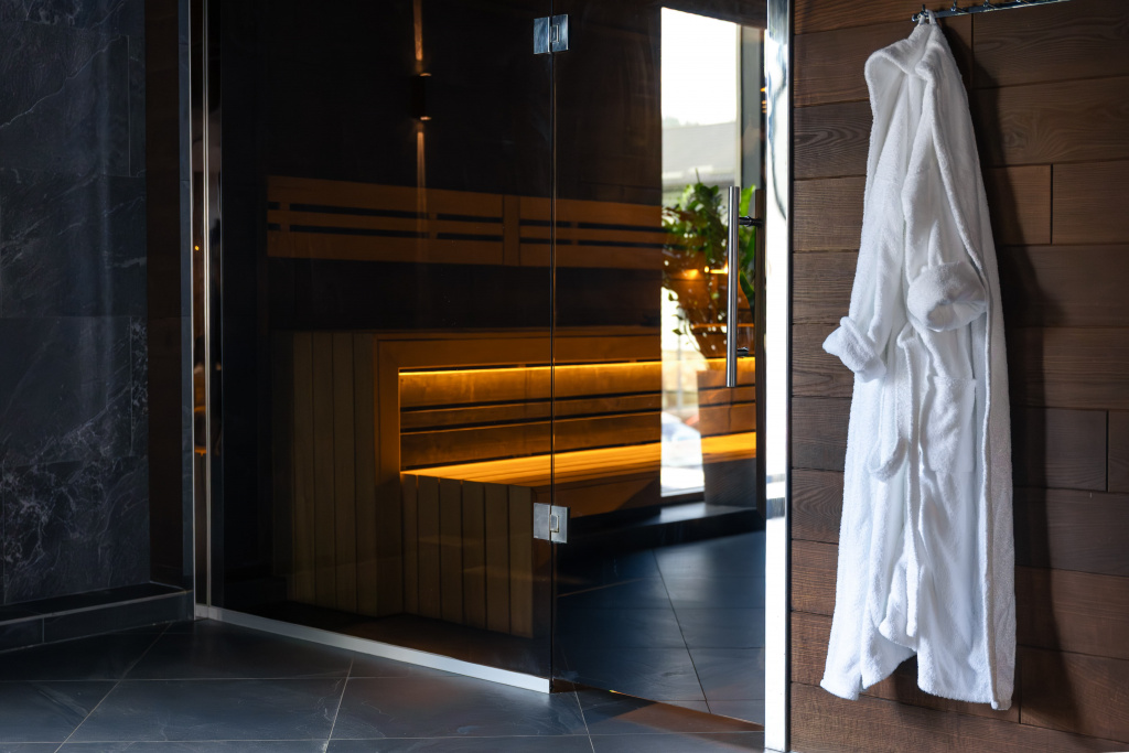robe-wooden-wall-near-sauna-warm-spa-interior (1).jpg robe-wooden-wall-near-sauna-warm-spa-interior (1).jpg